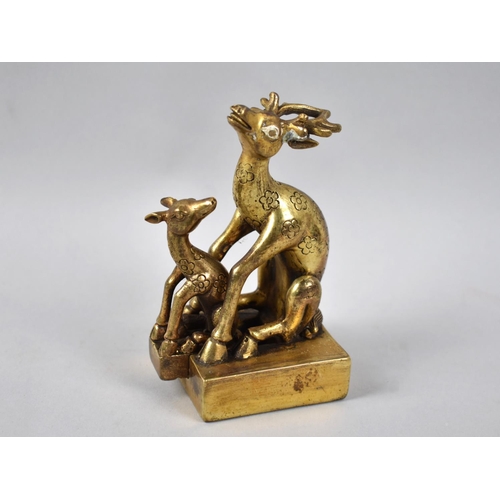 171 - A Gilt Bronze Oriental Double Seal in the Form of Mating Deer, 12.5cms High