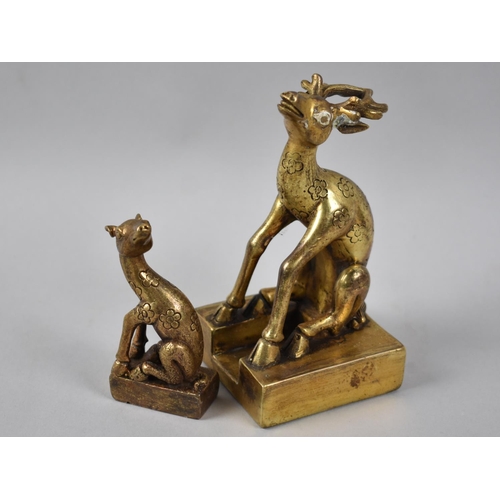 171 - A Gilt Bronze Oriental Double Seal in the Form of Mating Deer, 12.5cms High