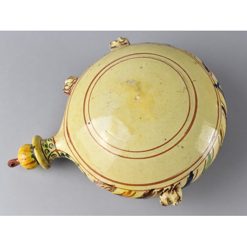 179 - A Continental Faience Circular Moon Flask with Screw Off Stopper, 24cms High