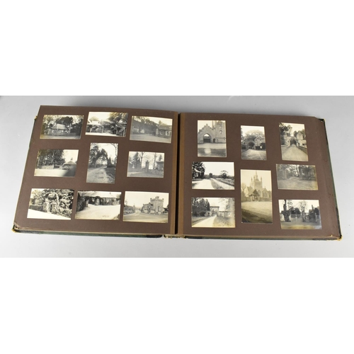 211 - A Vintage Photograph Album Containing Monochrome Photographs of Famous Buildings and Views in Englan... 