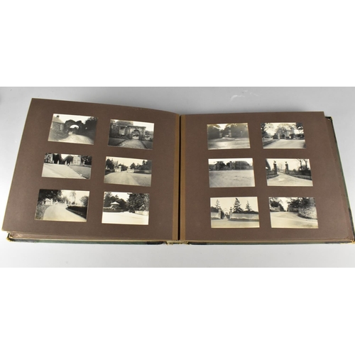 211 - A Vintage Photograph Album Containing Monochrome Photographs of Famous Buildings and Views in Englan... 