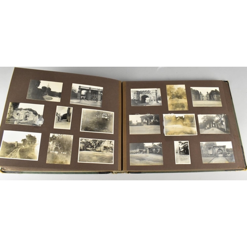 211 - A Vintage Photograph Album Containing Monochrome Photographs of Famous Buildings and Views in Englan... 