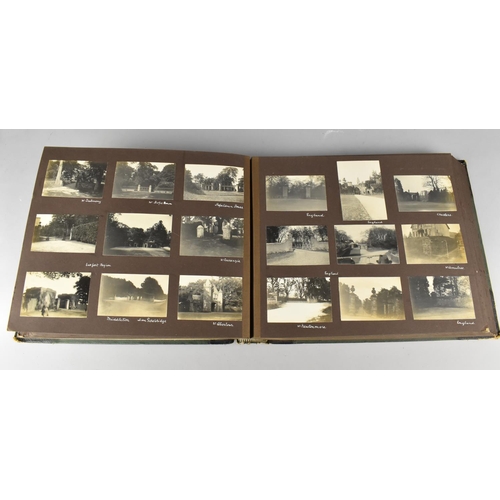 211 - A Vintage Photograph Album Containing Monochrome Photographs of Famous Buildings and Views in Englan... 