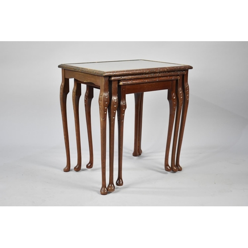 248 - A Nest of Three Mahogany Tables