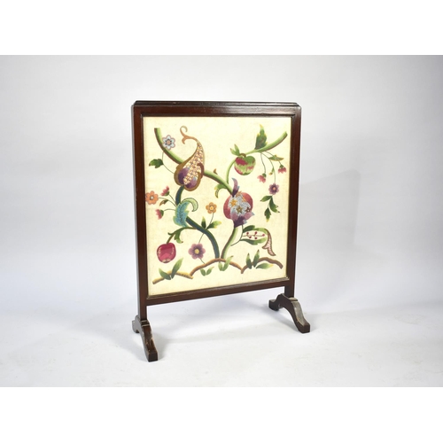 252 - An Edwardian Mahogany Framed Silk Embroidered Fire Screen 55cms Wide and 76cms High