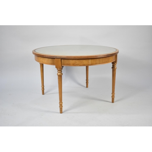 274 - A Modern Walnut Circular Coffee Table with Reeded Supports, 70cms Diameter