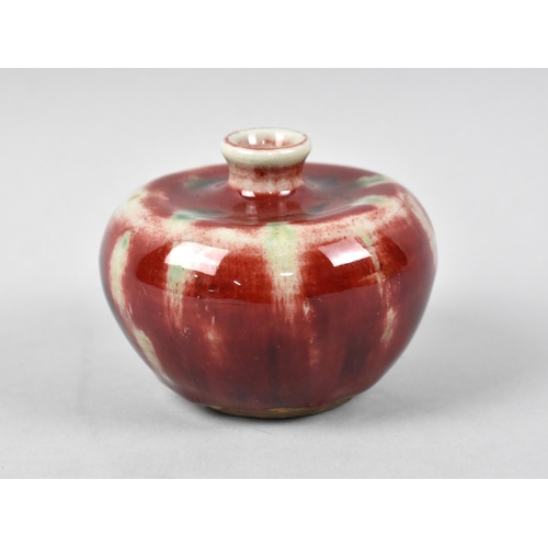 295 - A Reproduction Chinese Drip Glazed Vase of Squat Bottle Form, 7cm high