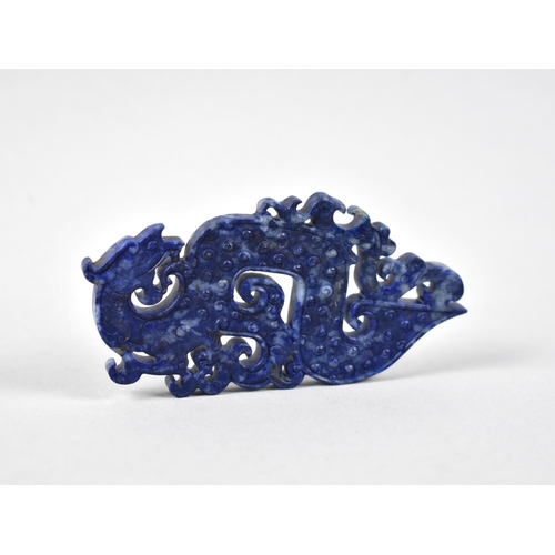 298 - A Reproduction Chinese Lapis Lazuli Effect Amulet in the form of a Chi Dragon, 10cm Tall