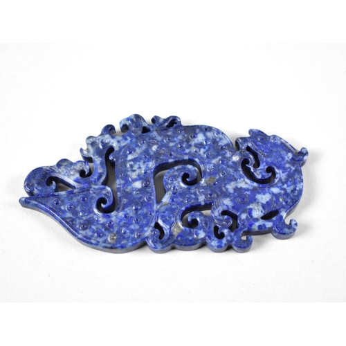 298 - A Reproduction Chinese Lapis Lazuli Effect Amulet in the form of a Chi Dragon, 10cm Tall