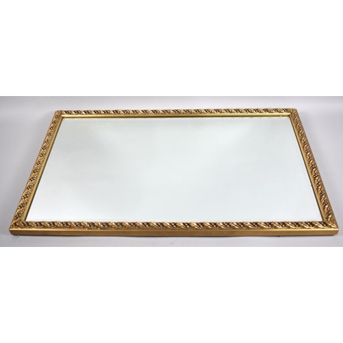 329 - A Rectangular Gilt Framed Wall Mirror, 67x39cms