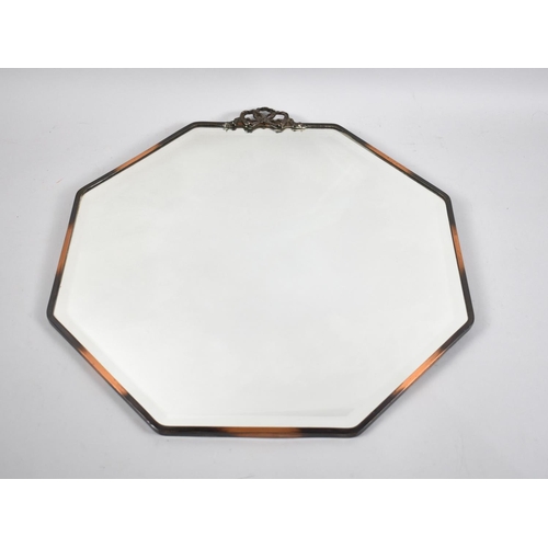 339 - A 1950s Octagonal Bevelled Edge Wall Mirror, 50x46cms