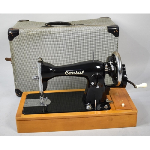 384 - A Vintage Cased Manual Sewing Machine, The Consul