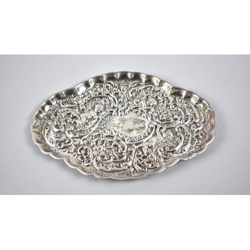 428 - A Silver Dish with Ornate Repousse Decoration, 17.5cm wide