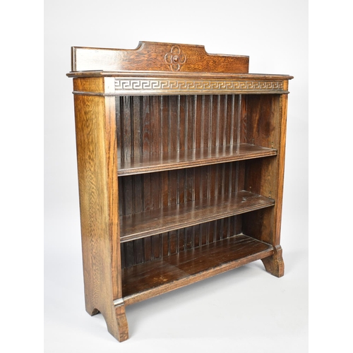 45 - An Edwardian Oak Galleried Bookcase, Top Rail with Blind Carved Greek Key Design, 91.5cms Wide, Two ... 