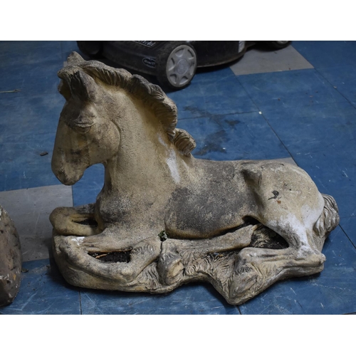 474 - A Reconstituted Stone Garden/Patio Ornament, Reclining Foal, 63cms Long