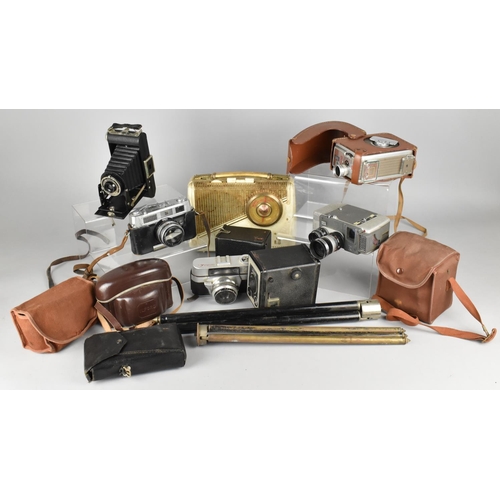 504 - A Collection of Various Vintage Cameras, Camera Tripods, Radio etc