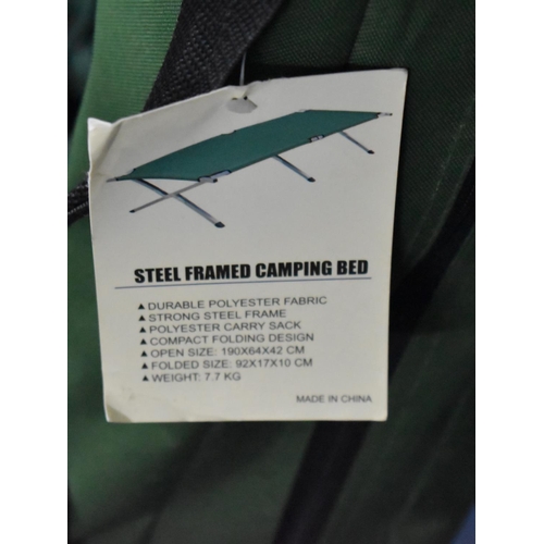 510 - A Folding Steel Framed Camping Bed in Carrying Bag, Open Size: 190x64x42cms