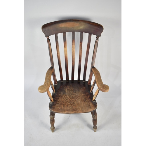 538 - An Elm Seated Kitchen Armchair