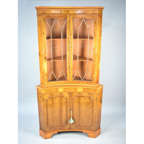 541 - A Modern Yew Wood Inverted Bow Fronted Corner Cabinet, 91cms Wide