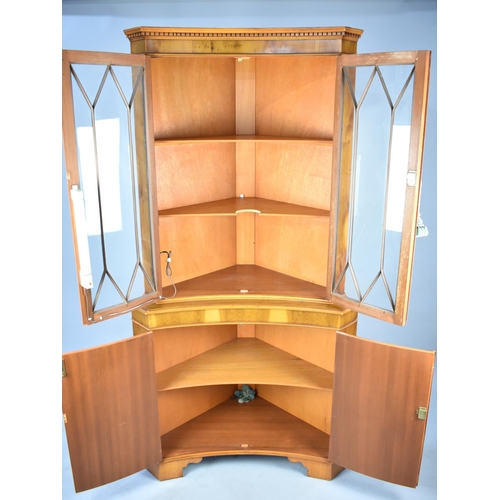 541 - A Modern Yew Wood Inverted Bow Fronted Corner Cabinet, 91cms Wide