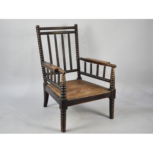 546 - A Late 19th/Early 20th Century Bobbin Framed Armchair with Bergere Seat, AF