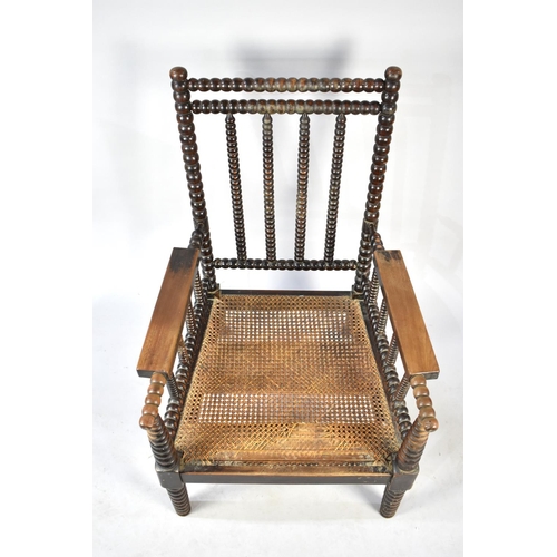 546 - A Late 19th/Early 20th Century Bobbin Framed Armchair with Bergere Seat, AF