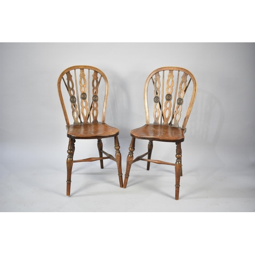 553 - A Pair of Windsor Style Dining Chairs with Splat and Spindle Backs