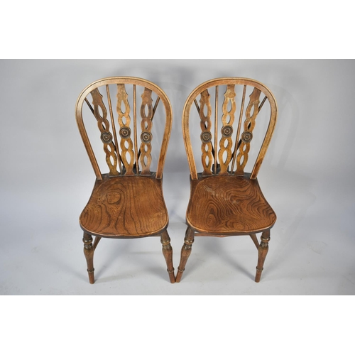 553 - A Pair of Windsor Style Dining Chairs with Splat and Spindle Backs