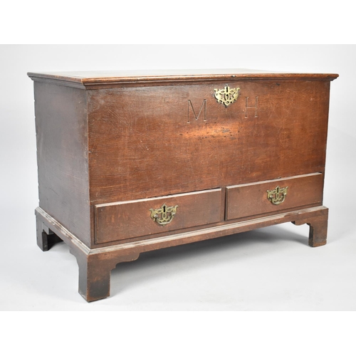 71 - A 19th Century Oak Lift Top Coffer Chest Inscribed MH having Two Drawers to Base, 94cms Wide