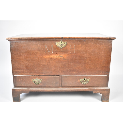 71 - A 19th Century Oak Lift Top Coffer Chest Inscribed MH having Two Drawers to Base, 94cms Wide