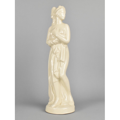 75 - A White Glazed Ceramic Study of Classical Nude with Robe, 34cms High