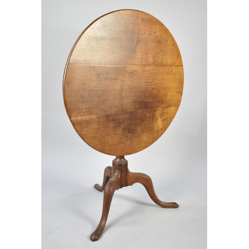 83 - A 19th Century Oak Snap Top Tripod Table, 79cms Diameter