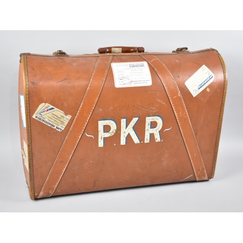 84 - A Vintage Suitcase by Pioneer Luggage with Various Vintage Airline Paper Labels and Monogrammed PKR