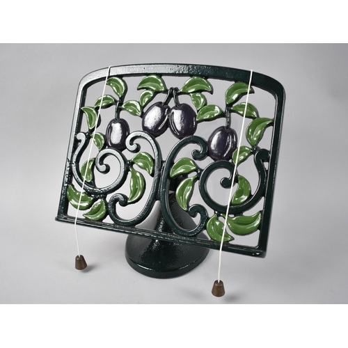 91 - A Modern Black and Green Enamelled Cast Metal Recipe Book Rest, Decorated with Cherries, 96cms Wide