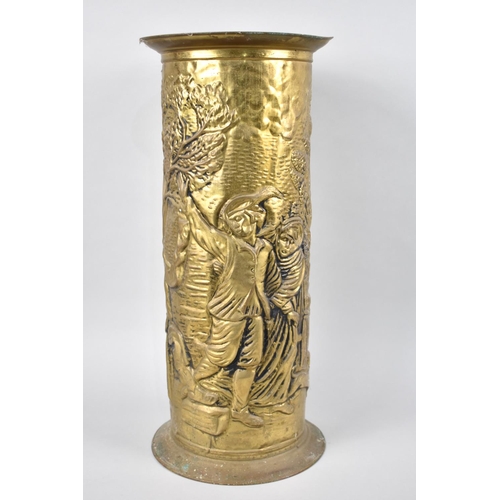 93 - A Mid 20th Century Pressed Brass Cylindrical Stick Stand Decorated with Tavern Scene, 47cms High