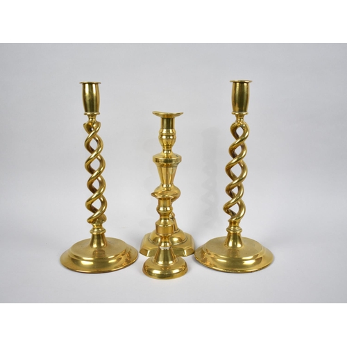 96 - A Pair of Open Spiral Brass Candlesticks, 30cms High, Together with Two Single Brass Candlesticks