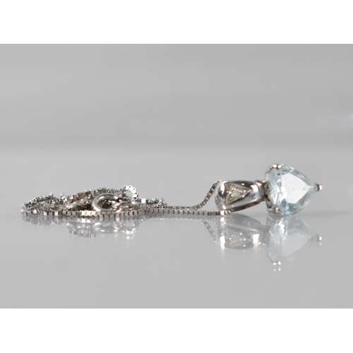 67 - An 18ct White Gold, Diamond and Aquamarine Heart Shaped Pendant on Chain, Aquamarine Measuring 6.9mm... 