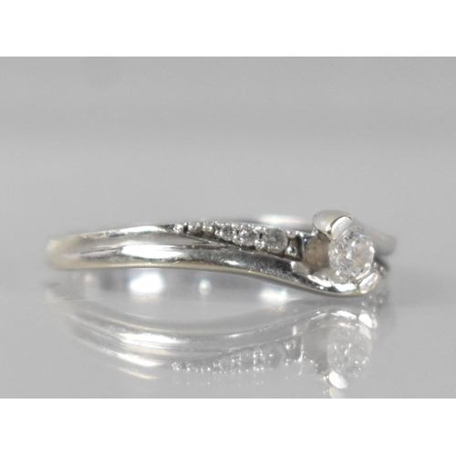 29 - A Modern 9ct White Gold and Diamond Ring, Central Tension Mounted Round Brilliant Cut Diamond Measur... 