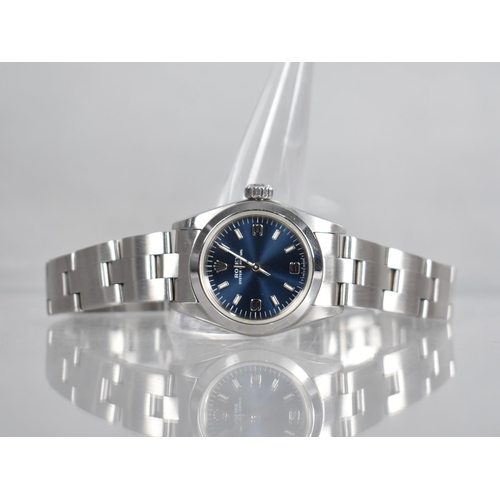 10 - A Ladies Stainless Steel Rolex Oyster Perpetual Wristwatch, Blue Dial with Baton Hour Indicators and... 