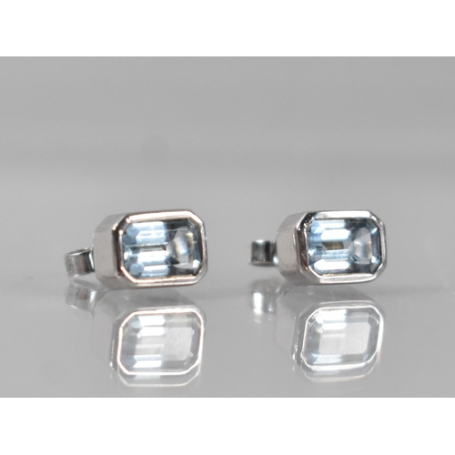 72 - A Pair of Octagon/Emerald Cut Aquamarine Earrings, Stones Measuring 6.2mm by 4.3mm, Collet Mounted i... 