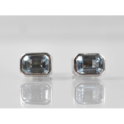 72 - A Pair of Octagon/Emerald Cut Aquamarine Earrings, Stones Measuring 6.2mm by 4.3mm, Collet Mounted i... 