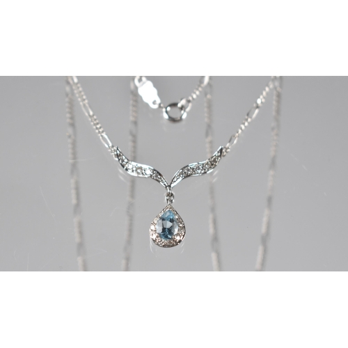 74 - An 18ct White Gold, Topaz and Diamond Set Necklace by Unoaerre, Pear Cut Topaz Set in Five Claws wit... 