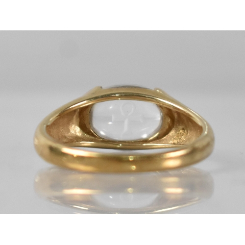 66 - A 9ct Gold and Oval Cabochon Rock Crystal Ring having Reverse Etched Ankh, Signed for Uri Geller and... 