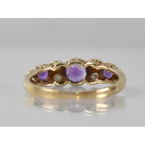 38 - A Vintage Amethyst and Seed Pearl Ladies Boat Style Ring, Central Round Cut Stone Measuring 5.5mm Di... 