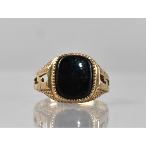 39 - A 9ct Gold and Onyx Signet Ring, Rectangular Onyx Panel Measuring 9.5mm by 11.5mm, Raised on a Textu... 