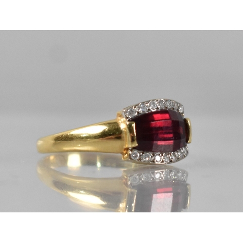 40 - An 18ct Gold, Garnet and Diamond Ring, Central Domed Fancy Chequerboard Cut Stone Measuring 5.9mm by... 