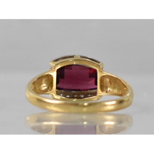 40 - An 18ct Gold, Garnet and Diamond Ring, Central Domed Fancy Chequerboard Cut Stone Measuring 5.9mm by... 