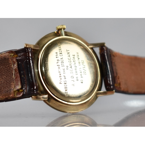 2 - A Late 1950s or Early 1960s Gold Coloured Metal Cased Longines Wristwatch, Champagne Dial with Baton... 