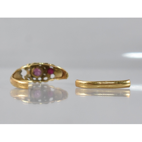 44 - An 18ct Gold, Ruby and Diamond Boat Shaped Ring, Central Mixed Cushion Cut Stone 3.2mm Diameter Havi... 