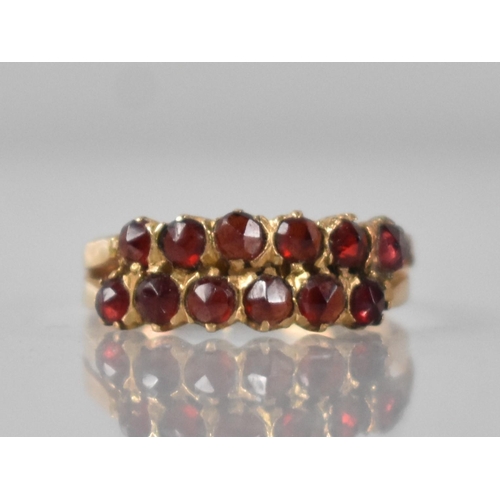 50 - An 18ct Gold and Garnet Ring comprising Two Rows of Rose Cut Type Garnets in Mixed Milgrain, Claw an... 